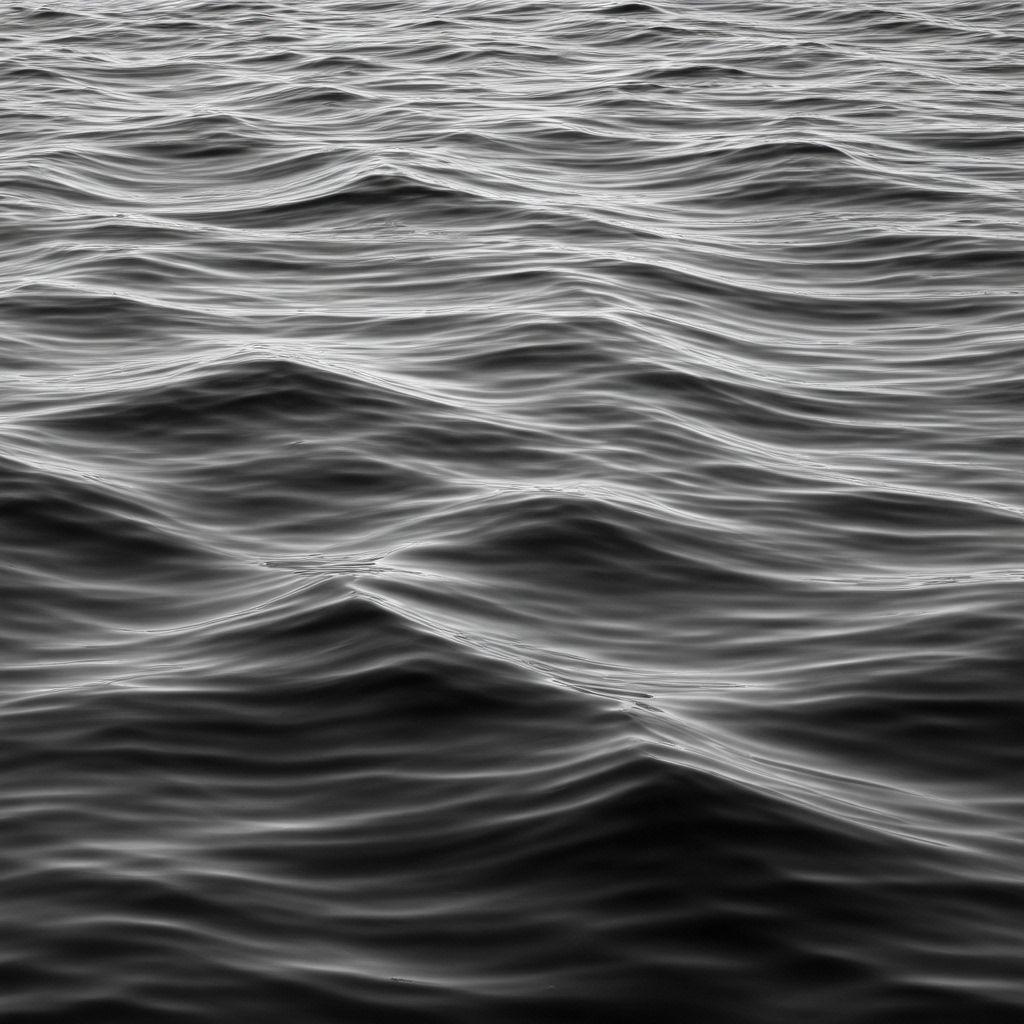 Water surface with dramatic lighting
